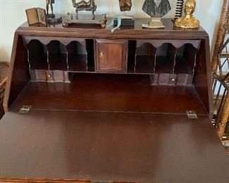 Interior of flat front drop down antique desk