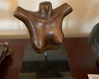 modern bronze and stone female torso by W. Connell asking $80