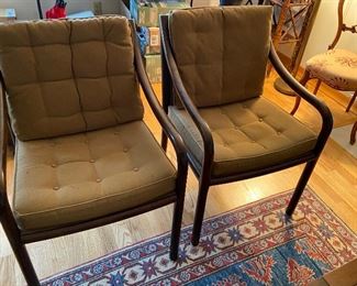 Pair of mid century style tufted armchairs from the Seattle Design Center asking $100 for the pair
