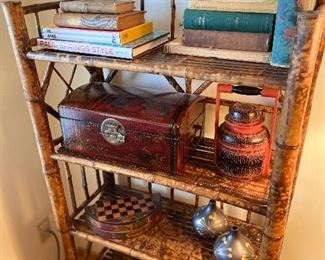 Vintage and antique collectible books, with asian antique collectibles on display.