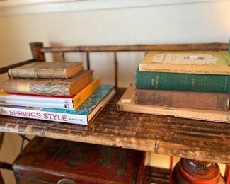 Close up of antique books there are modern books for sale that are shown in another photo