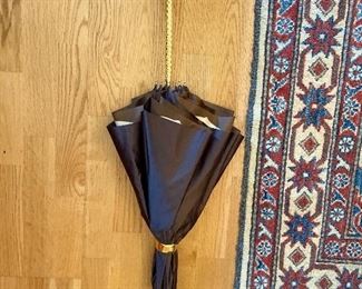 several wonderful stylish umbrellas including this pretty one by Pasotti sking $160