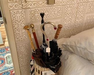 A selection of stylish umbrellas and walking sticks