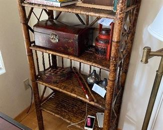 Scorched style bamboo bookshelf with four shelves, 27"w x 52"h x 11.75" deep. Asking $250.