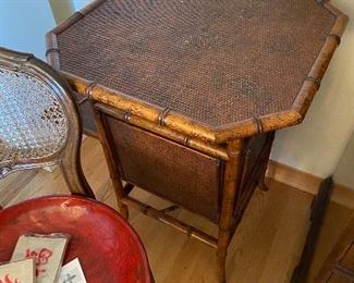 Distrssed bamboo octagonal table from Jane Piper Reid with four fold down shelves for plants or books or whatever you like! 22" x 30"h asking $290
