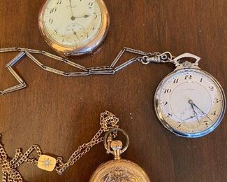 Various stop watches - gold filled the one that is closed is the Elgin in the next photo