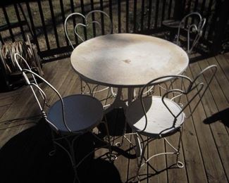 cast iron base table & 4 ice cream chairs