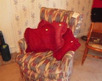 upholstered rocker, pillows