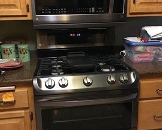 LG gas stove with double oven and LG microwave -- only 3 years old.