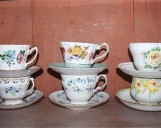 Lot 209
Porcelain Tea Cup & Saucers