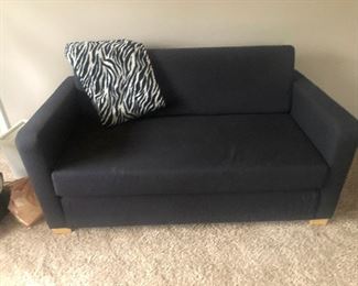 Ikea sleeper sofa with one padded shoulder
