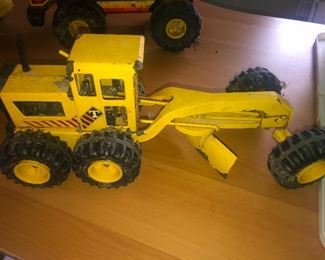 Vintage TONKA truck! I don't know which one this is but if you're an expert please make sure to mansplain this to me for at least two hours. My name is Cheryl, and you can find me yelling at my sister Holly during the sale.