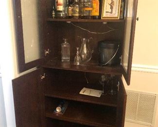 Modern minimalist china cabinet (The liquor won't be there by Thurs. Trust me.)