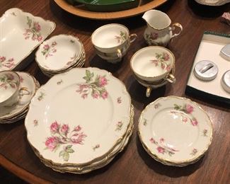 Pretty set of Bavarian “Moss Rose” china, cookie cutters