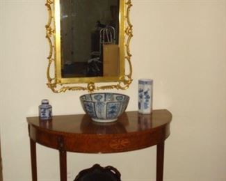 Half round Inlayed table, gold chippendale  mirror with eagle, tin tray