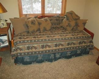 Nice clean day bed with trendle bed