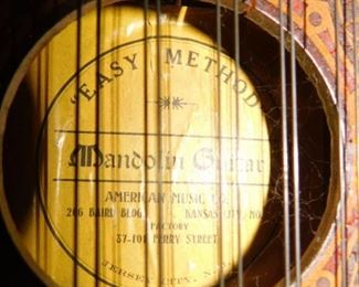 Panama Model 1915 Mandolin-Guitar has damage on back