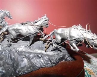 Flat Out For Red River Station A limited-edition Pewter sculpture by Michael Boyett