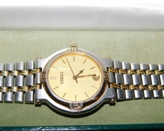Gucci women's watch 18Kt Gold plated model 3000