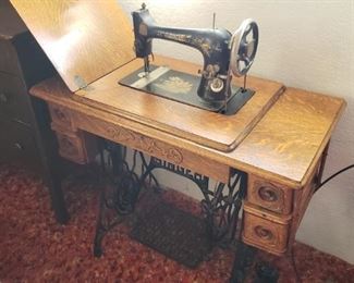 Antique Sewing Machine in Cabinet. We found the purchase order for it from 1929. 