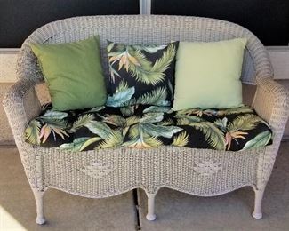 #5 - Wicker loveseat with cushion and pillows - $145