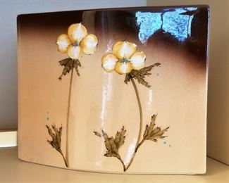 #14 - Very unusual ceramic vase - $25 There is another photo that shows the top view of shape.