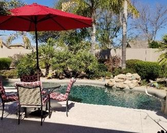 The patio table and 4 chair are sold. We have one red umbrella still available for $55 and also the Shepard's hook is still available for $25.