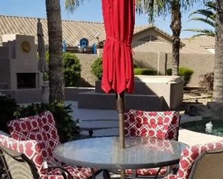 Patio set sold and this umbrella...there is one red umbrella left see #116