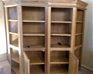  #103 without the center piece. This is showing the 2 pieces. You can purchase each piece separately. Each piece separately is $135. Beautiful all wood. Great light color knotty pine like the master bedroom furniture. Has the same roping details. These are fabulous pieces at great bargains! Tons of storage and book shelf space!