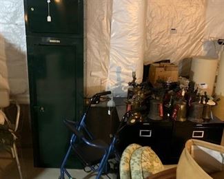 a gun cabinet and file cabinets