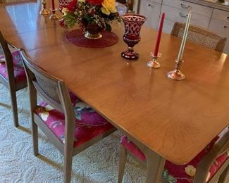 Mid Century Modern Dining room table and chairs. Buffet is marked Century. Believe that the dining room table and chairs may also be Century.