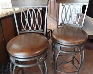 Heavy metal swivel bar stools