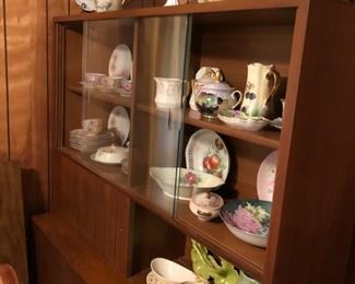 China cabinet full of hand-painted china