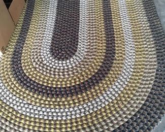 Hand woven rug oval, another round and another smaller oval