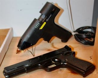 A glue gun and a Marksman BB gun.  If you had them both while being attacked by a bear, the glue gun might slow him down and the BB gun would just make him mad.