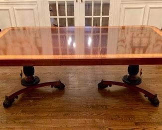 Burled wood dining table purchased from Lammerts Furniture. Table measures 46" W x 72" L.  Includes two 16" leaves.  104" total length with leaves