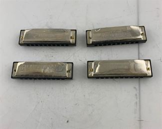 set of 4 harmonicas