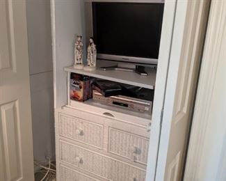 Wicker tv cabinet with drawers below