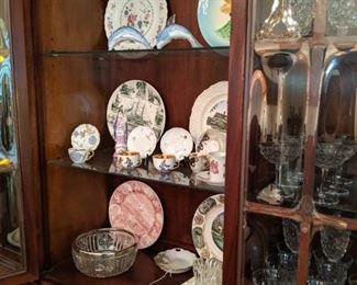 Century china cabinet with convex glass.