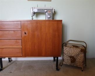 vintage Pfaff sewing machine in teak cabinet