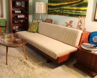 flokati rug, vintage Scandi wall hangings, stereo equipment