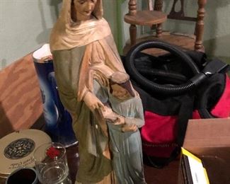 One of many religious items, This is a large chalk statue of St. Anne