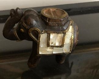 Carved and shell elephant.