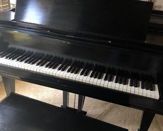 Antique Adam Schaff baby grand piano