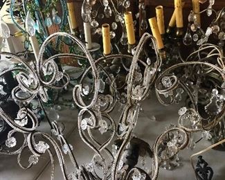 Lots of antique chandeliers 