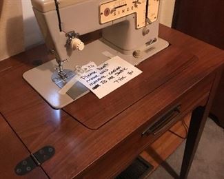 ONE OF TWO VINTAGE SEWING MACHINE IN CASES