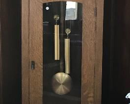 $1,995.00 Contemporary L. & J. G. Stickley (Manlius, New York) tall case clock, based on the original 1910 Leopold Stickley design.  Purchased new in 1985 at Klingman's (Grand Rapid, Michigan) 80" x 27" x 16" Keeping perfect time but the gong strike needs adjustment.