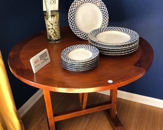 $195.00 32" Round flip top wood table, from Mole Hole (Lansing, Michigan) with original price tag $595.00 