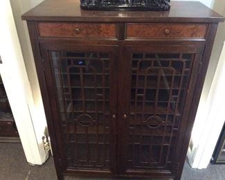 $225.00 Antique sheet music cabinet, 48"h x 33"w x14"d, with multiple shelves and 2 drawers over 2 doors with fretwork - circa 1920s/1930s - would make a great liquor cabinet too!
