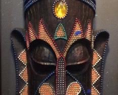 $40.00  wooden beaded wall hanging mask.  38"